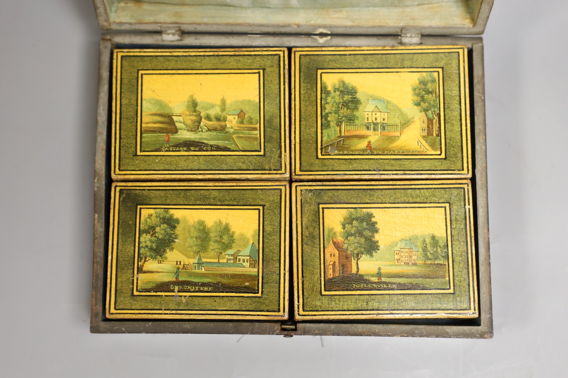 A 19th century Belgian stained sycamore box containing four counter boxes with named views, with mother of pearl fish shaped and circular gaming counters